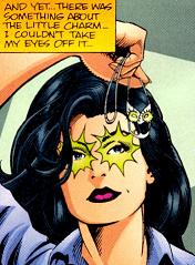 Eden examining the charm